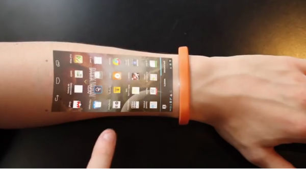 Asombrosa pulsera proyecta la pantalla de tu smartphone en la piel – VIDEO